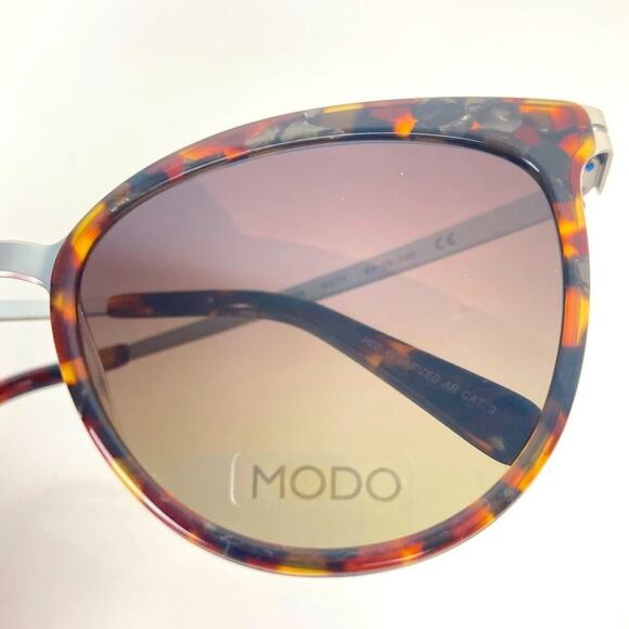 MODO 454 Titanium Polarized Tortoise Sunglasses - $257. main image 11